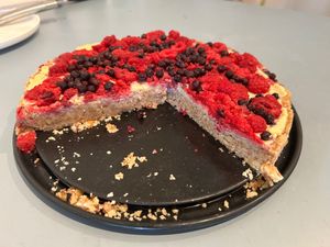 Vegan raw cake, cashew crème patissiere, red fruit topping. at Café Conscient  in Nyon
