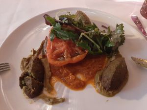 Baked Tomato with peas falafel, seasonal menu at Klosterstübchen in Harsewinkel