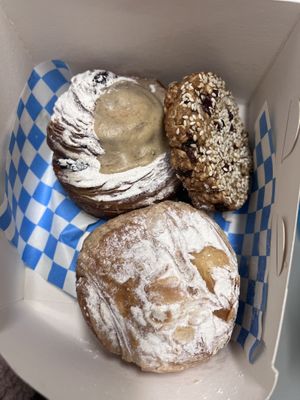 Cinnamon swirl (top left) Almond croissant & oatmeal & raisin cookie.   at Okja in East London