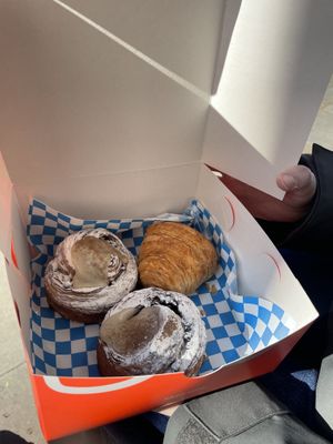 The Cinnamon Swirl and plain croissant pastries   at Okja in East London