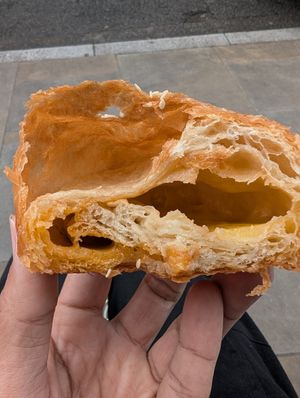 Inside the cheese and pesto bun at Okja in East London