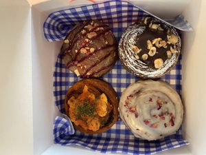 PB + J swirl, Choc and hazelnut swirl, pesto and cheese swirl, and vanilla bean croissant   at Okja in East London