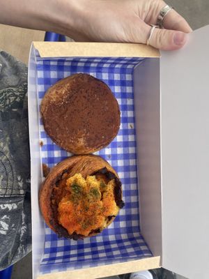 Pain au chocolat and pesto and cheese swirl   at Okja in East London