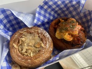 Almond croissant and cheese and pesto   at Okja in East London