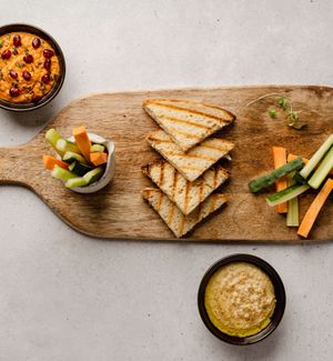 Botanic plate.
Raw carrots and cucumber with hummus and muhammara. Sourdough chapla bread. at Barra Botánica in Lima