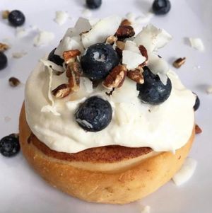 Orange Frosting, Pecans, Blueberries, and Coconut at Cinnaholic in Madison