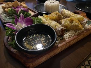 Fried spring rolls (fried tofu in the background)  at Hoang's Kitchen in Ho Chi Minh City
