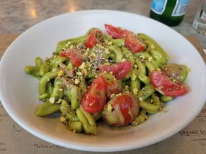 Homemade pistachio pesto with sautéed cherry tomatoes (casarecce) at Emilia's Crafted Pasta  in East London