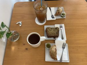 Vegan chorizo, egg and cheese empanadas, house-made oatmilk in our coffees, and vegan banana bread ❤️  at Tetherball Coffee in Jacksonville