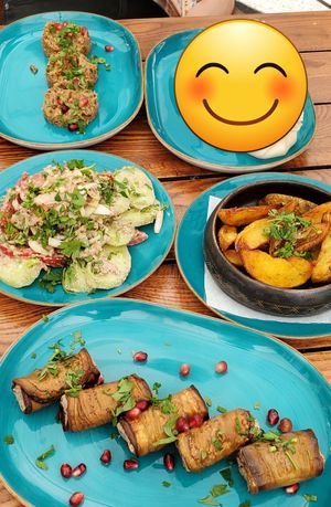 Aubergine rolls, spiced potatoes, salad, pkhali at Chinkalnia Restauracja Gruzińska in Gdansk