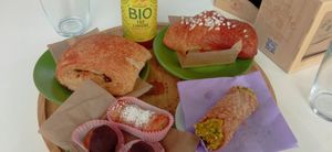 Cannolo al pistacchio, cannoncino, bignè al cioccolato, pain au chocolat, brioche alla confettura at Pasticceria Vegana Biologica La Magnolia in Verona