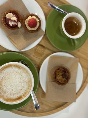 Soy cappuccino, espresso and selection of gluten free vegan mini pastries   at Pasticceria Vegana Biologica La Magnolia in Verona