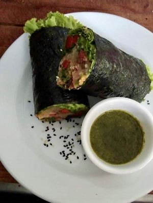 Top Pick! One of our favourites. Homemade cashew cheese and homemade hash brown combined with fresh salad wrapped in a seaweed roll. Served with homemade dipping sauce. at Health Oasis Resort in Koh Samui