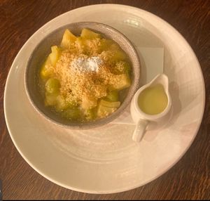 Apple and gooseberry crumble with custard.    at Brasserie Blanc in Portsmouth
