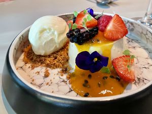 Vegan panna cotta with passion fruit and yuzu ice creamm  at Zebedeus in The Hague