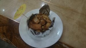 無名火豆腐: Tofu with elastic texture which might stir your curiousity, bamboo shoots, savory smelling shitake closely packed & roasted all together in a tin foil. Recommended. at Tiandi Vegetarian in Nanjing