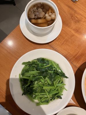 Mushroom soup with truffle, stir fried spinach   at Din Tai Fung 101 in Taipei