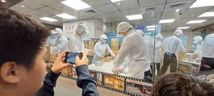 Making the dumplings -- souvenir photos part of the fun at Din Tai Fung 101 in Taipei