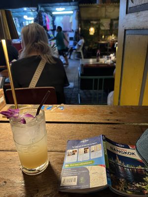 Lime and ginger soda and street view seating  at Madame Musur in Bangkok