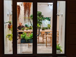 Looking through an outside window at Loving Bistro at Loving Bistro in Prague