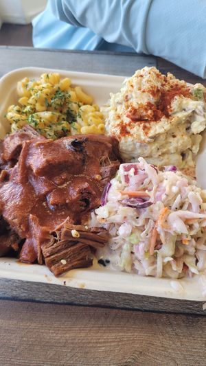 Large plate with brisket, slaw, potato salad and mac at Vegan Mob in Vallejo