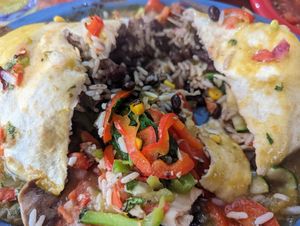 The chicken burrito made vegan. It was HUGE and packed full of veggies, rice, and beans. at Oscar's Cafe in Springdale