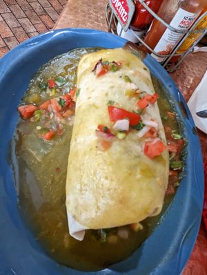 The chicken burrito made vegan. It was HUGE and packed full of veggies, rice, and beans. at Oscar's Cafe in Springdale