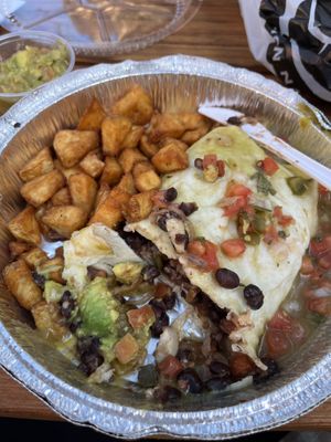 Verde burrito to-go with no sour cream  at Oscar's Cafe in Springdale