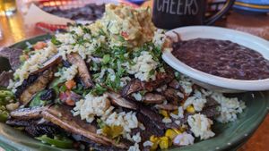 Some of the people here know what vegan means. 

But dude, order the nachos without cheese and add rice and portobello mushroom. They need vegan items like this on the menu! at Oscar's Cafe in Springdale