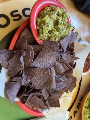 Huge basket of chips, plus a bowl of guac   at Oscar's Cafe in Springdale