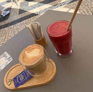 Flat white and the red smoothie   at Yellow Bourbon in Faro