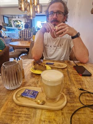 Oat latte and banana cake (vg, gf) at Yellow Bourbon in Faro