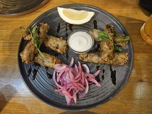 Hojas de col rellenas de arroz y verduritas (la salsa no es vegana) at Umaueyon in Cordoba