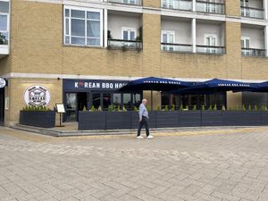Outdoor seating on the river Thames  at Korean BBQ House in East London