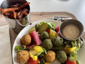 falafels quantum field salad and a side of sweet potato fries  at Big Bang Café in Meyrin