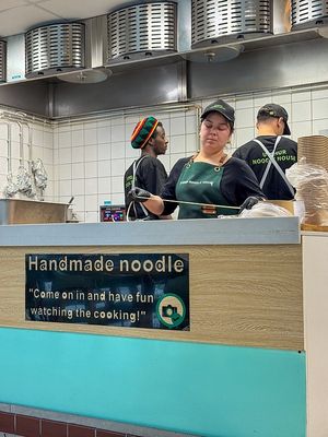 open-kitchen, noodles in the making at Uyghur Noodle House in Helsinki