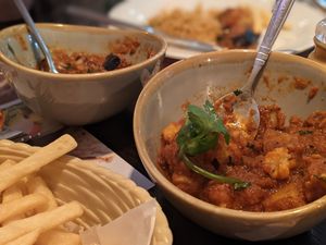 Yes, we like chips with our curry, very self-indulgent. at Rishis Indian Aroma in Stirling