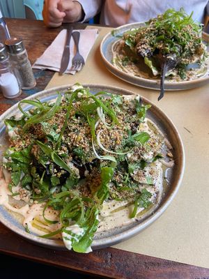 Melanzane al forno con taina, semi ed erbe at Les Grands Vilains in Granville