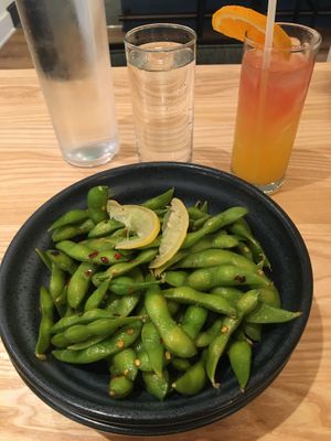 Edamame starter with "RX" natural refreshment (orange, pineapple, coconut water, Kombucha) at Mill Valley Kitchen in Rochester