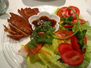 Veggie Crispy Duck. The vegan duck is good, but there is not much else on the plate. at Quan Bo De Cuisine Vegetarienne in Montreal