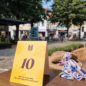 Order at screen, take your number, and wait at table for your order
 at Hawaiian Poké Bowl - Simon Stevinplein in Bruges