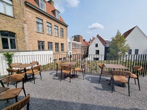 Upstairs area outdoor seating at Hawaiian Poké Bowl - Simon Stevinplein in Bruges