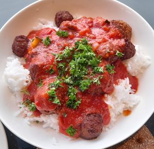 Rice, falafels and tomato sauce at Ravintola Arvo in Espoo
