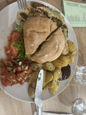 Black bean burger. Sorry I’d already started it!   at Aquila in Weston-super-mare