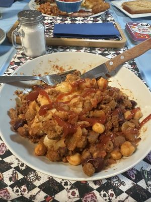 Vegan chilli jacket potato, delicious and a bit spicy!!   at Mac's Tearoom in Gran Canaria