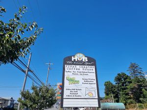 Sign on highway at First Chapter Coffee House in Gold Beach