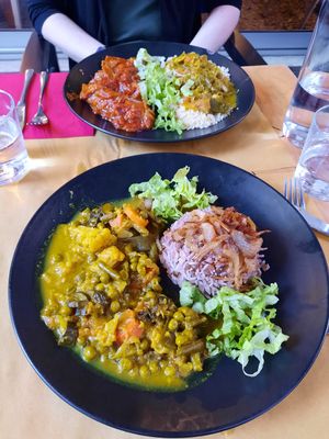 Top: Aubergine, Couscous. Bottom: Vegetable curry, onion Rice at Orient Experience in Venice