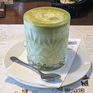 Matcha latte with oat milk at VakVarjú Csónakház in Budapest
