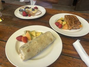 Sweet potato burrito, banana oatmeal pancakes, and jackfruit melt  at 9th Island in Haleiwa
