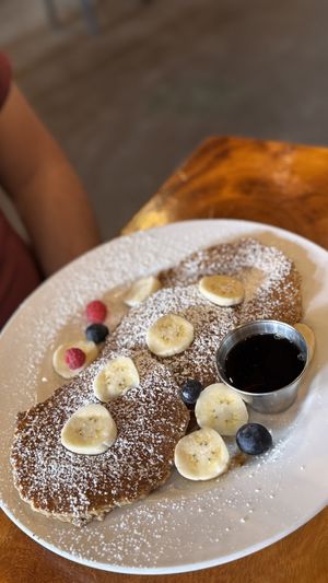 Pancakes with maplesirup and fruit  at 9th Island in Haleiwa